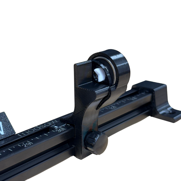 the rear rest on a modsaw arrow saw allows archers to cut without pulling knocks