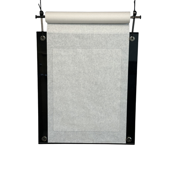 the back side of the paper tuner bow tuning system with a roll of paper