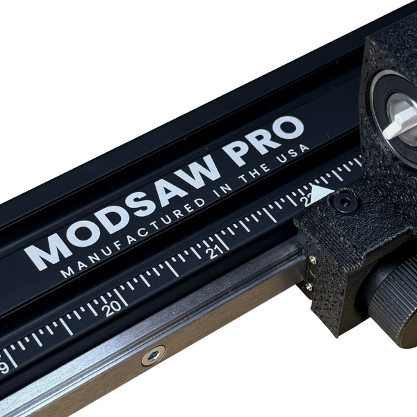 a closeup of the modsaw pro arrow saw showing the measurement engraing