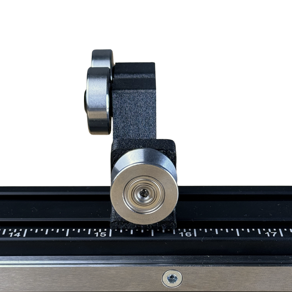 the modsaw pro arrow saw uses linear bearings for smooth movement while squaring arrows against the blade